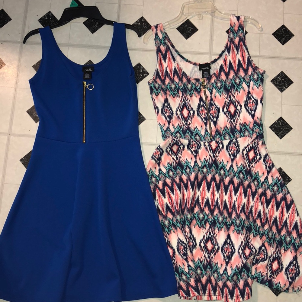 Two dresses of the same variety - pink and blue.